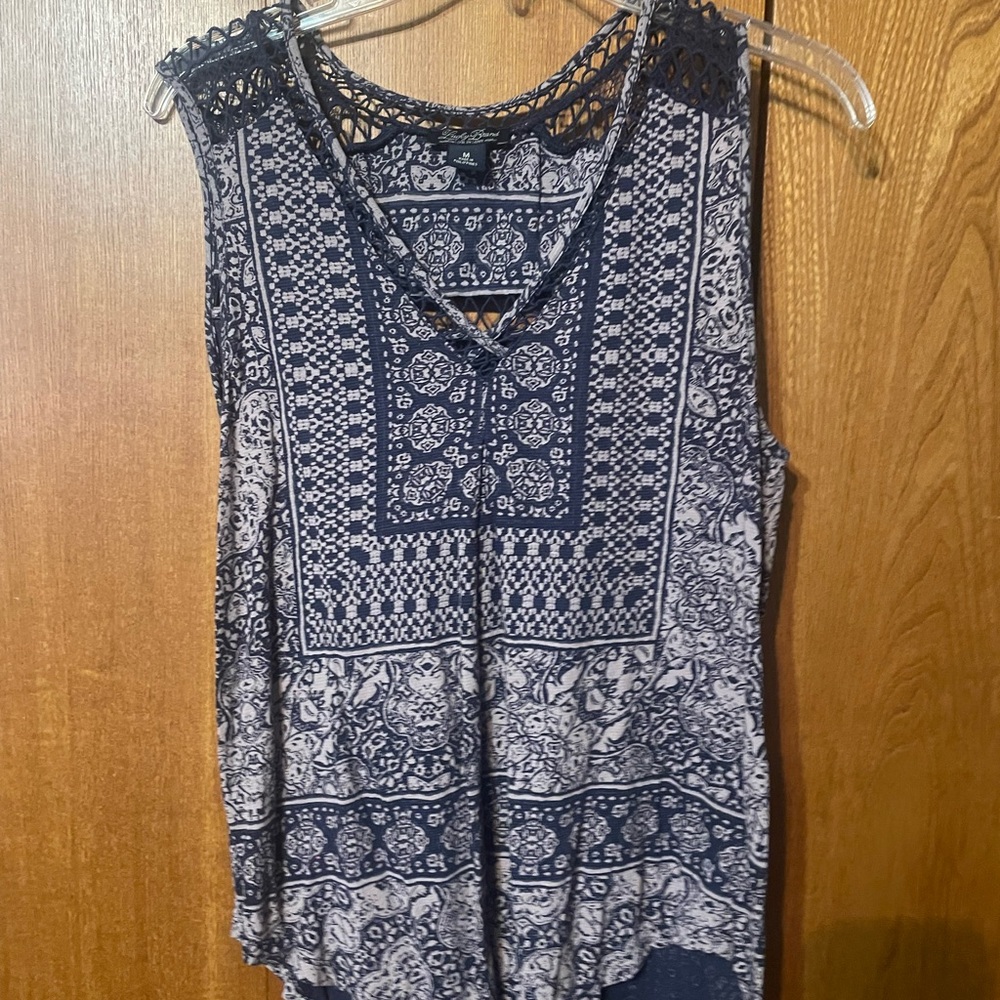 Lucky brand sleeveless top.  Crochet lace accents.
